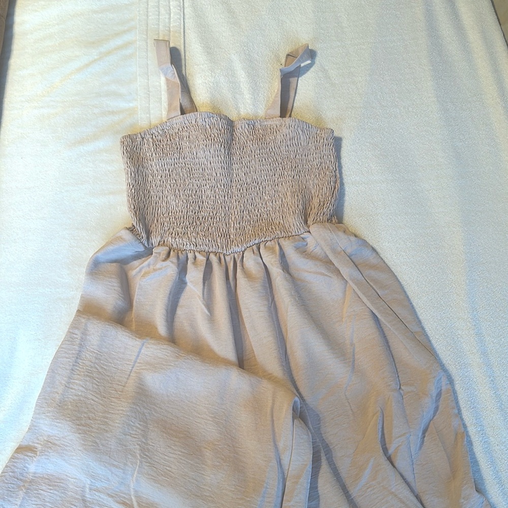 Blush pink, beach walker romper. Wide leg and stretch top.
